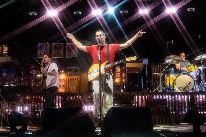 Bleachers performing on tour